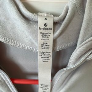 Lululemon size for three-quarter length zip up with two pockets like gray
